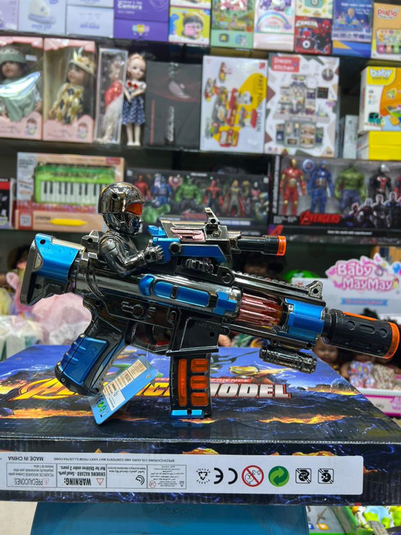 خرید تفنگ موزیکال باطری خور | فروشگاه اسباببازی قشم