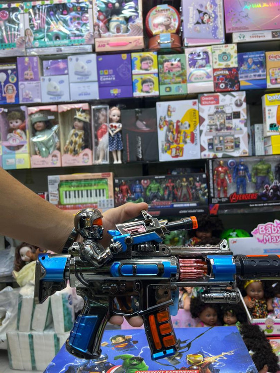 خرید تفنگ موزیکال باطری خور | فروشگاه اسباببازی قشم